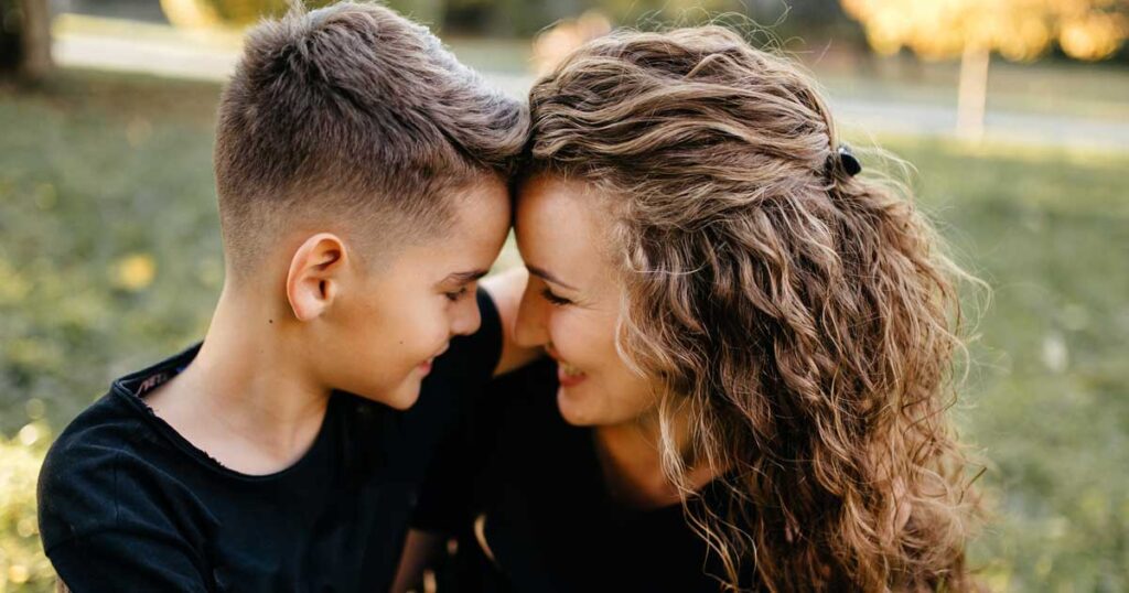 Mother and son spend time outdoors in the park